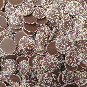 Hannahs brown jazzies are milk chocolate flavour buttons with multicoloured sprinkles on top